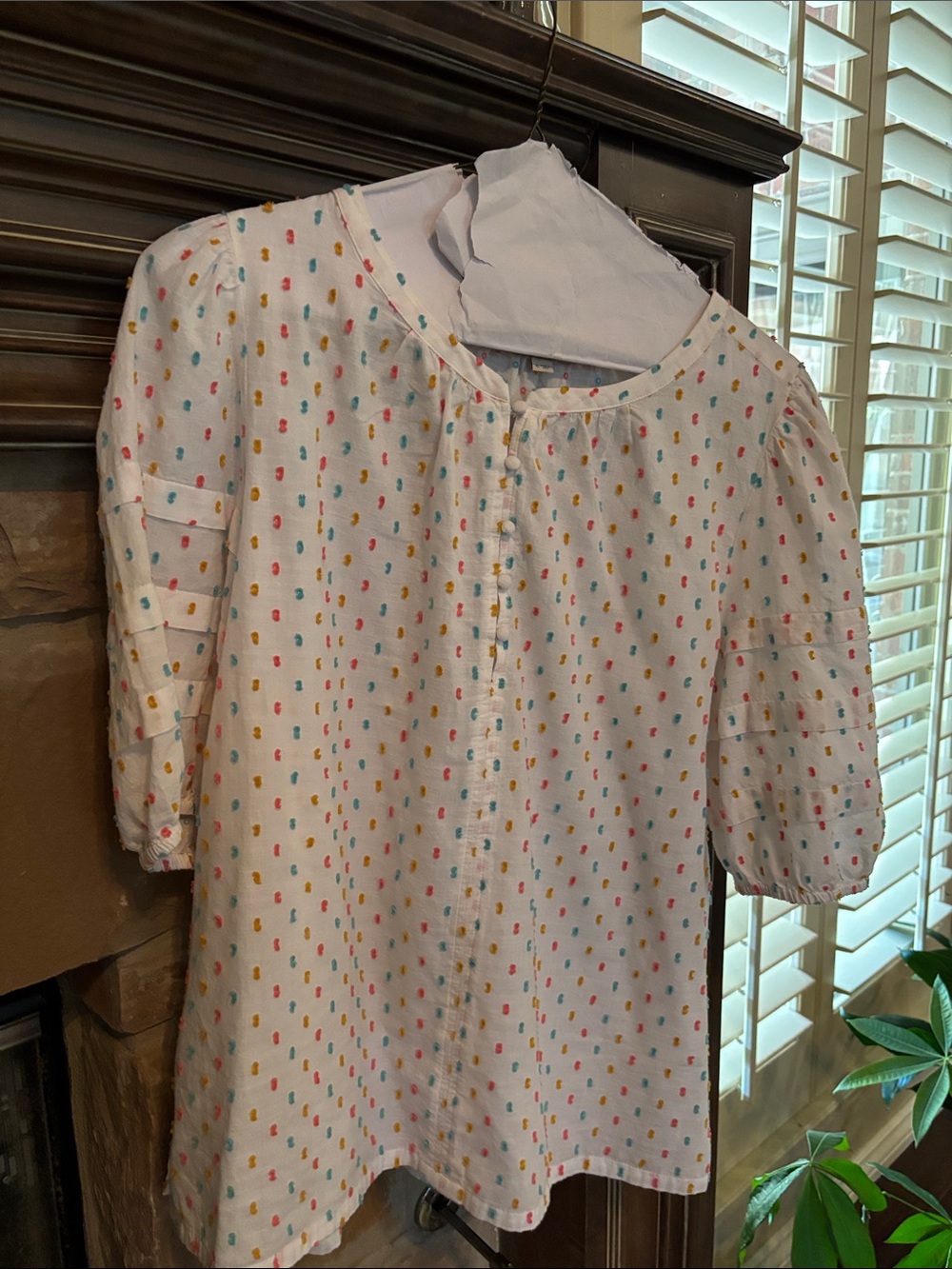 Loft XL white with gold, pink, and blue dots. Short-Sleeve with poofy sleeves.